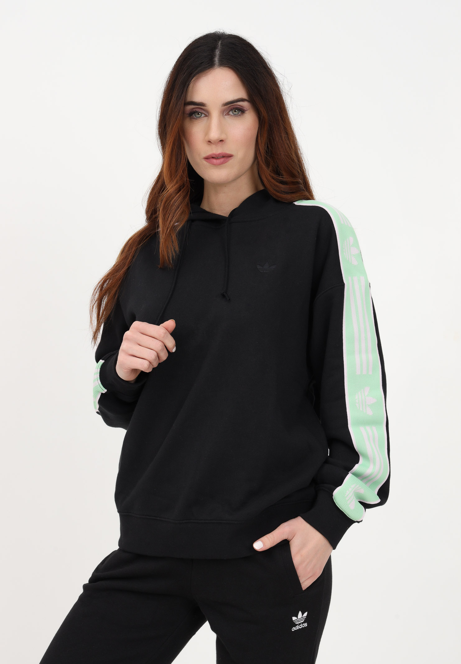 Black women's sweatshirt with hood and logo bands on the sleeves ADIDAS | HM1533.