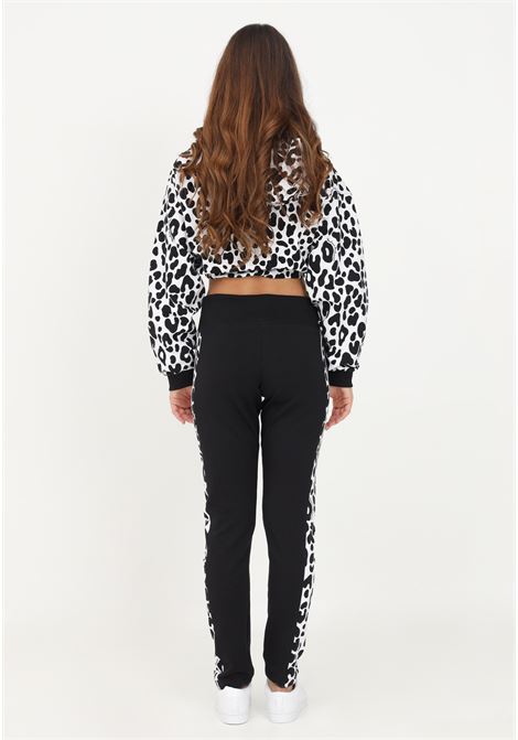 Sport trousers with Dalmatian pattern MOSCHINO | Pants | A431390190555
