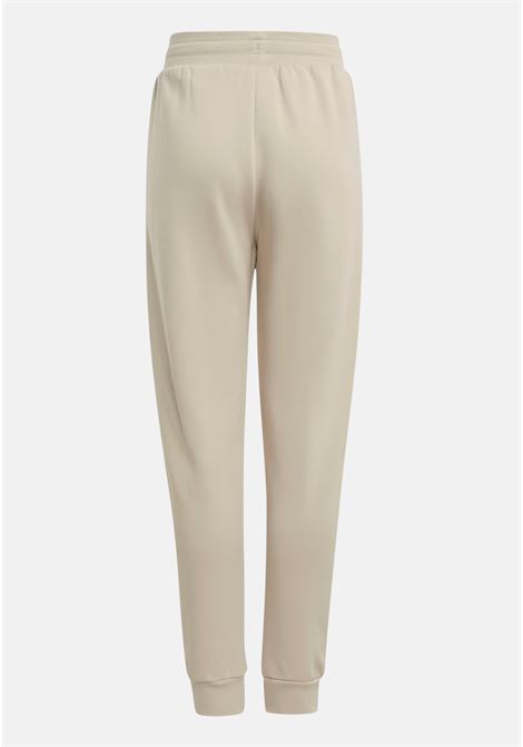 Adicolor beige sports trousers for boys and girls ADIDAS ORIGINALS | Pants | IJ9799.