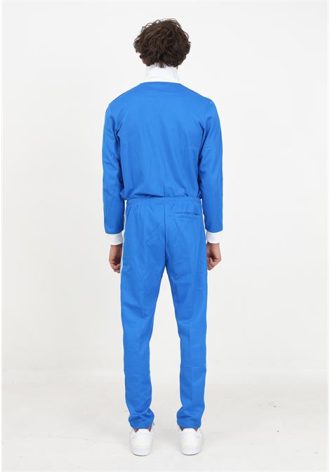 Light blue tracksuit trousers with men's logo ADIDAS ORIGINALS | Pants | IM4546.