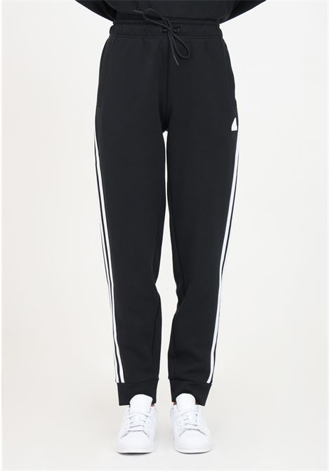 Pantalone sportivo nero da donna con tasche laterali ADIDAS PERFORMANCE | Pantaloni | HT4704.