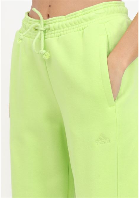 Pantaloni giallo fluo con elastico in vita e dettaglio su tasca sinistra ADIDAS PERFORMANCE | Pantaloni | IM0330.