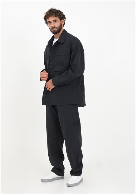 Casual black trousers for men in technical fabric CALVIN KLEIN JEANS | Pants | J30J323506BEHBEH