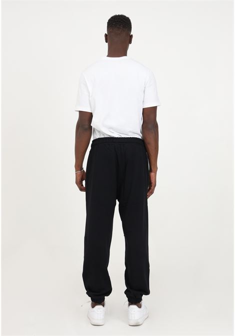 Pantalone da uomo felpato nero con logo a contrasto HINNOMINATE | Pantaloni | HNM241NERO