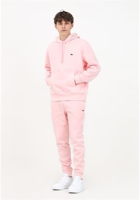 Pantaloni di tuta rosa con logo da uomo LACOSTE | Pantaloni | XH9624T03