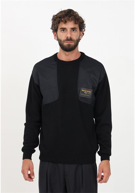 Black crew-neck sweater for men with satin patch MOSCHINO | Knitwear | A091852020555