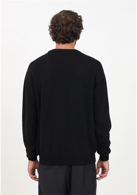 Black crew-neck sweater for men with satin patch MOSCHINO | Knitwear | A091852020555