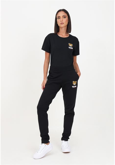 Black women's sports trousers with logo patch MOSCHINO | Pants | A689044130555