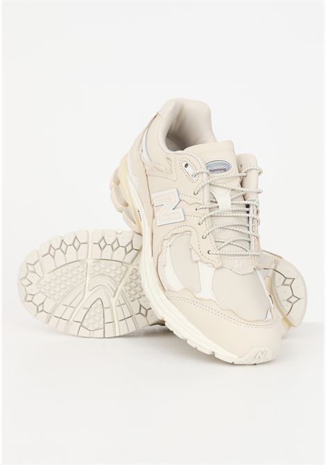 M2002RDQ butter-colored sneakers for men and women NEW BALANCE | Sneakers | M2002RDQ.