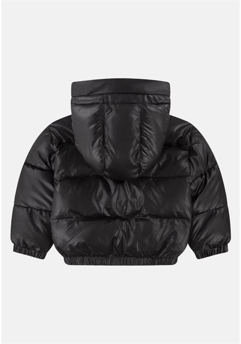 Black quilted jacket for boys with contrasting logo NIKE | Jackets | 86L074023