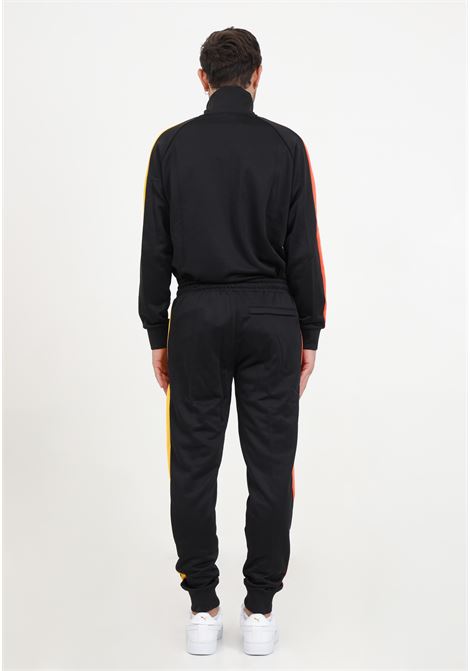 Pantaloni neri di tuta con logo da uomo PUMA | Pantaloni | 53948501