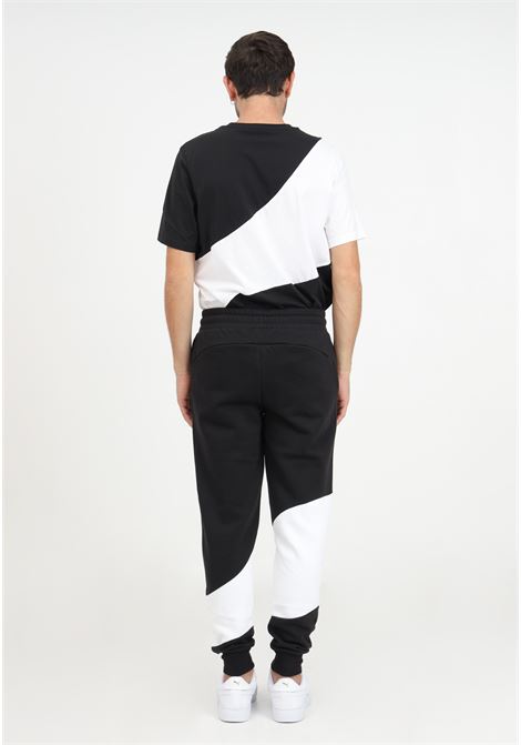 Pantaloni di tuta neri con logo da uomo PUMA | Pantaloni | 67333001