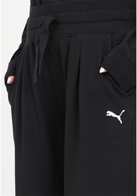 Pantaloni di tuta neri con logo da donna PUMA | Pantaloni | 67600701