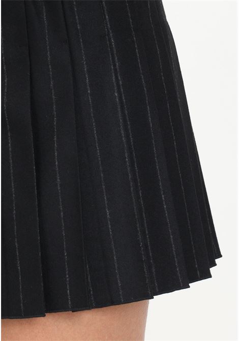Minigonna nera plissettata logata da donna VERSACE JEANS COUTURE | Gonne | 75HAE800N0219899