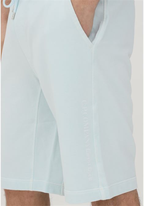 Light blue men's shorts in fleece by cp company  C.P. COMPANY | Shorts | 12CMSB265A-005398S820
