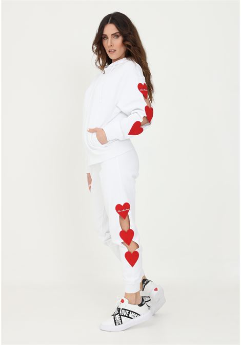 White women's trousers by love moschino with hearts and openings on the left side LOVE MOSCHINO | Pants | W158880M4266A00