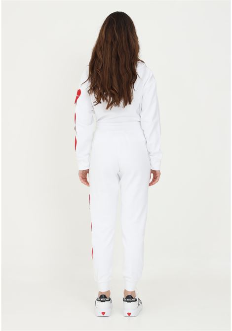 Pantaloni love moschino bianco da donna con cuori e aperture sul lato sinistro LOVE MOSCHINO | W158880M4266A00