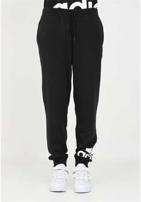 Pantaloni sport neri da uomo con stampa logo ADIDAS | GK8968.