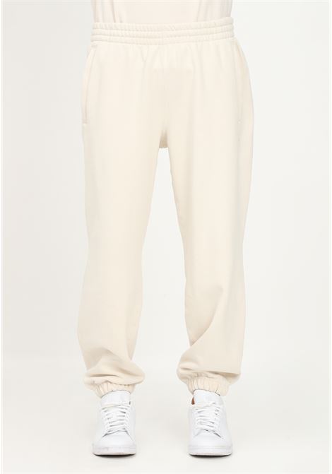 Pantaloni sport da uomo beige con logo tono su tono ADIDAS | H62546.