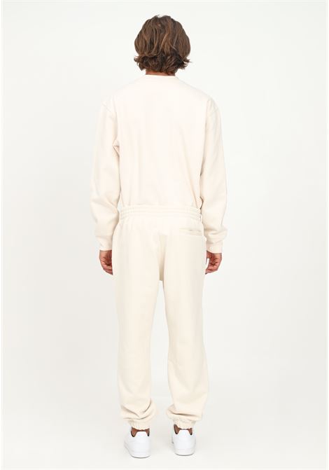 Pantaloni sport da uomo beige con logo tono su tono ADIDAS | H62546.