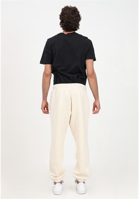 Cream sports trousers for men ADIDAS | HB7500.