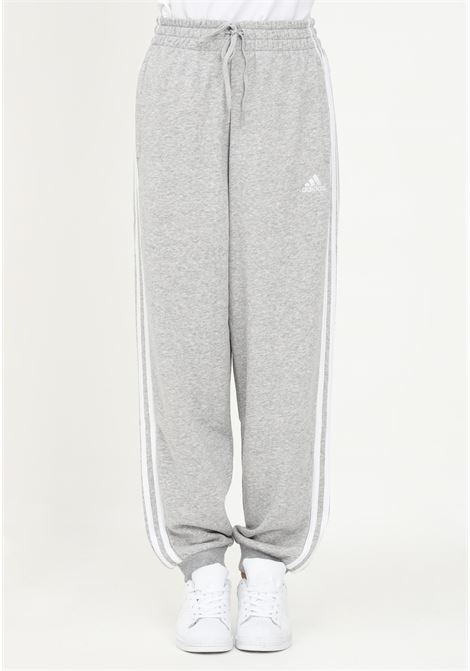 Gray sporty trousers for women with wide cut ADIDAS | HD4304.
