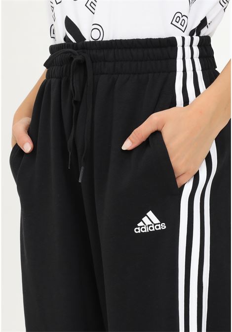 Black women's trousers with wide cut ADIDAS | HD4306.