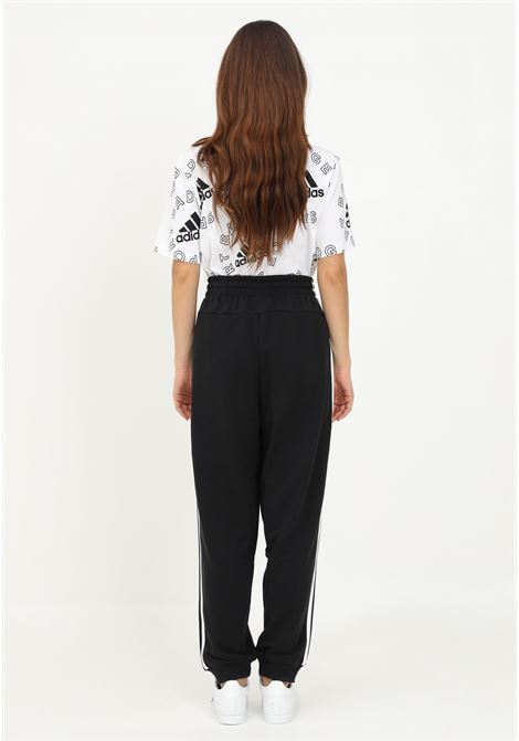 Black women's trousers with wide cut ADIDAS | HD4306.