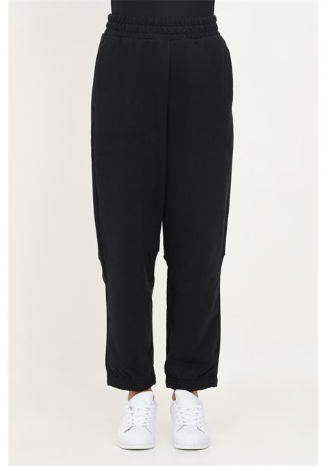 Pantalone sportivo nero da donna modello over ADIDAS | HM1790.