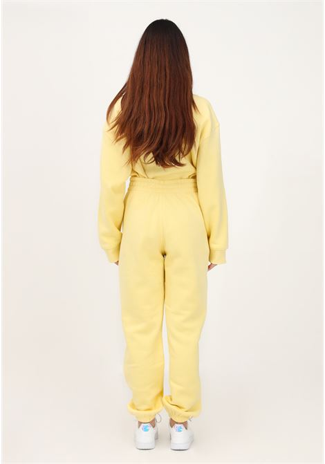 Pantalone sportivo da Jogging giallo da donna in pile Essentials ADIDAS | IA1249.