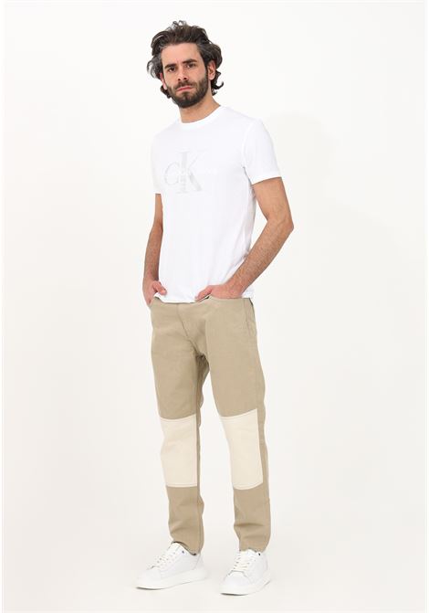 Jeans beige da uomo con motivo color block CALVIN KLEIN | Jeans | J30J3224251CD1CD