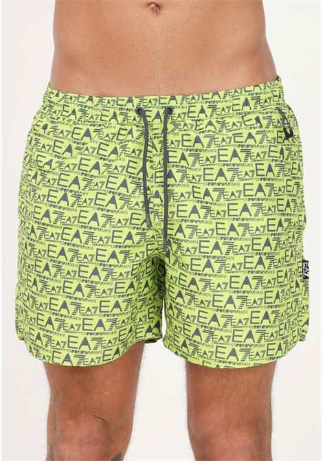 Shorts mare fluo da uomo con stampa logo all over EA7 | Beachwear | 9020003R74814883