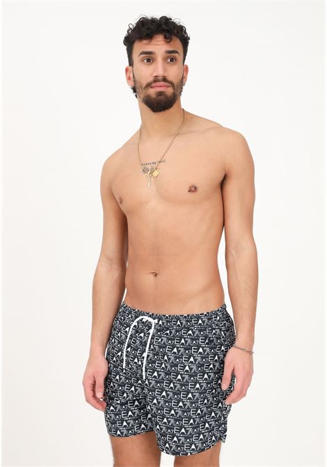 Shorts mare nero da uomo con stampa logo all over EA7 | Beachwear | 9020003R74823521