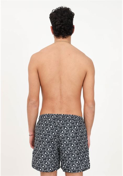 Shorts mare nero da uomo con stampa logo all over EA7 | Beachwear | 9020003R74823521