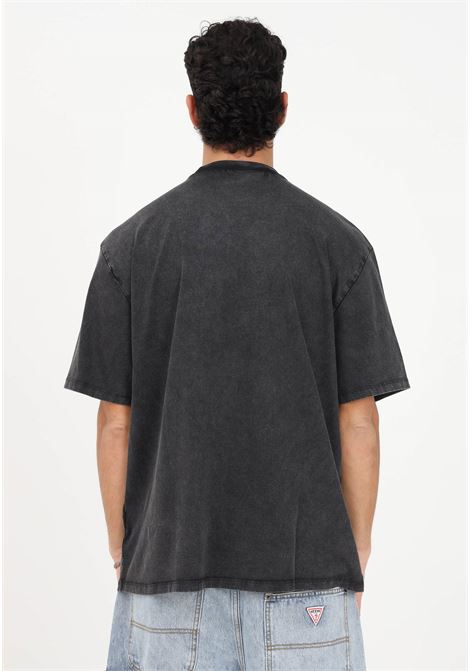 T-shirt casual nera da uomo con stampa logo frontale GUESS | T-shirt | M3GI31K9XF3JTMU