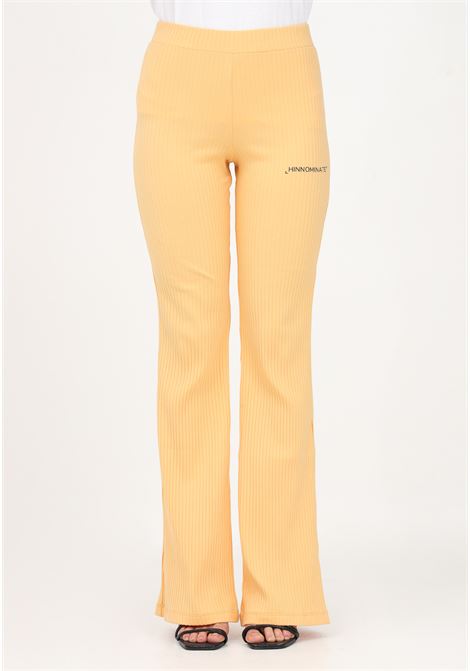 Pantalone casual a coste arancione da donna con stampa logo HINNOMINATE | Pantaloni | HNW728ARANCIO