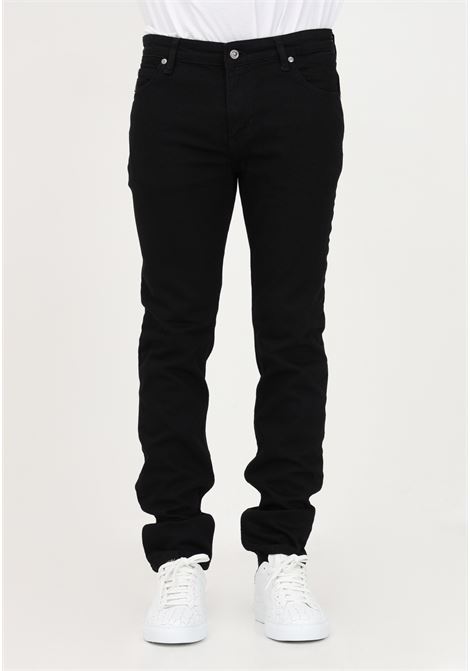 Black slim jeans for men with logo patch on the back JUST CAVALLI | Jeans | 74OBB5J0CDW48909