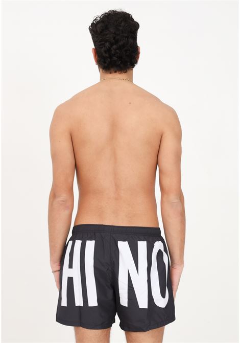Shorts mare nero da uomo con stampa logo lettering MOSCHINO | Beachwear | A428693081555