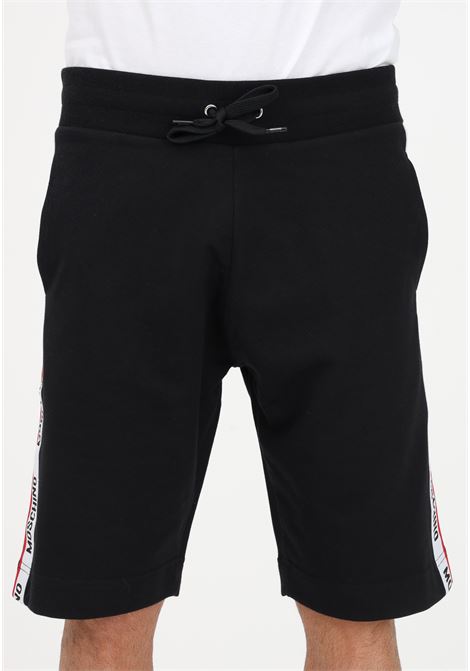 Shorts casual nero da uomo con fasce logate laterali MOSCHINO | Shorts | A688544090555