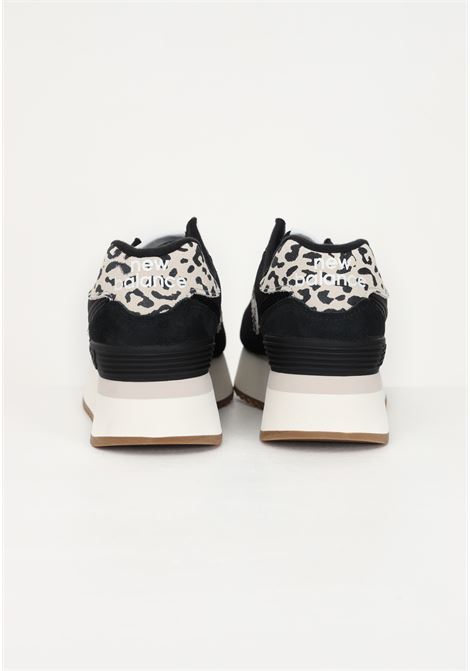574 women's black sneakers with animalier details NEW BALANCE | Sneakers | WL574ZDABLACK