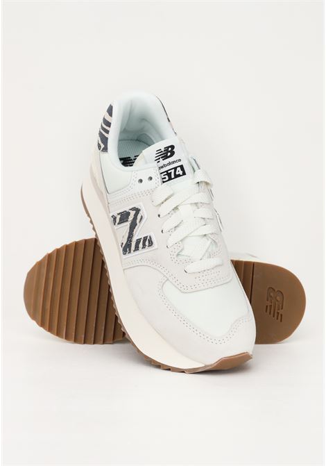 574 women's white sneakers with animalier details NEW BALANCE | Sneakers | WL574ZDDSEA SALT