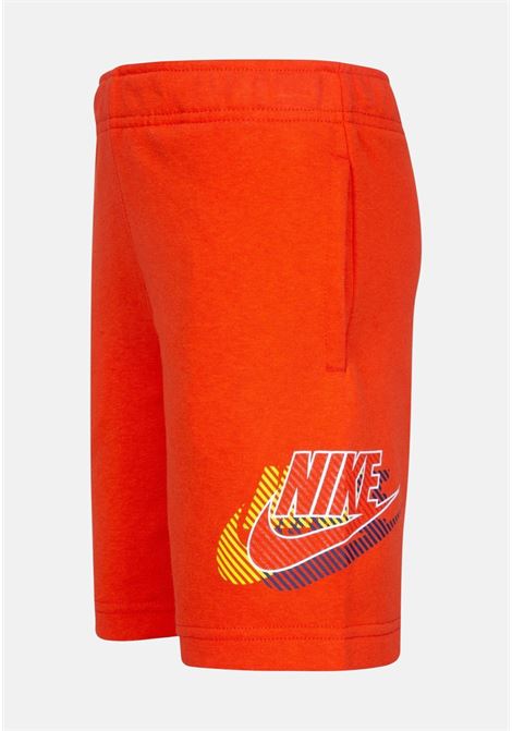 Shorts sportivo arancione da bambino con stampa logo laterale NIKE | Shorts | 86K467R7O