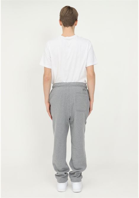 Pantalone sport grigio per uomo e donna con patch logo Jumpman NIKE | Pantaloni | DA9820091