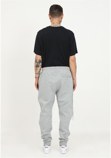 Pantaloni sportivi grigi per uomo e donna con maxi stampa swoosh NIKE | Pantaloni | DH1023063.