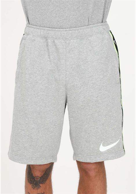 Shorts sportivo Repeat grigio da uomo NIKE | Shorts | FJ5317063