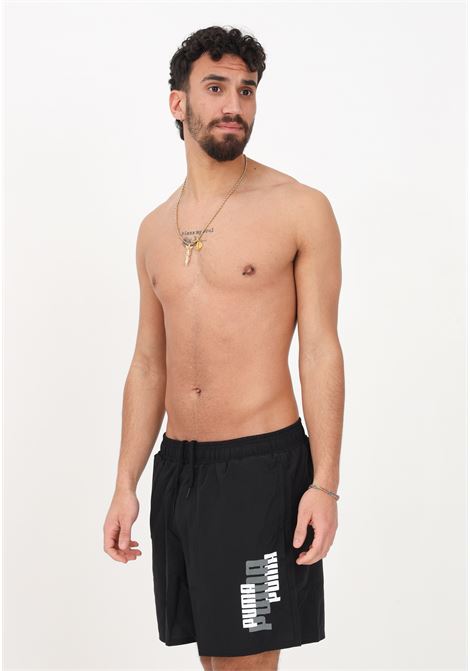 Shorts mare nero da uomo con stampa logo lettering PUMA | Beachwear | 67338101