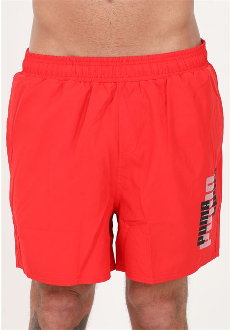 Shorts mare rosso da uomo con stampa logo lettering PUMA | Beachwear | 67338111