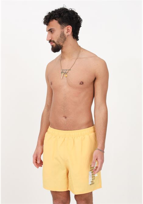 Shorts mare giallo da uomo con stampa logo lettering PUMA | Beachwear | 67338140