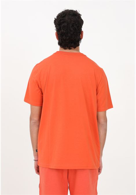 T-shirt sportiva arancione da uomo Essentials+ Tape PUMA | T-shirt | 84738294