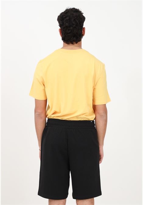 Shorts sportivo nero da uomo Essentials+ Tape PUMA | Shorts | 84738701
